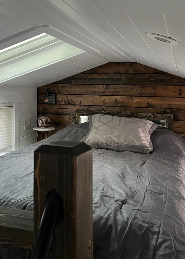 The Cabin at Beyond the Trail RV Park Has a Queen Bed in the Loft with Skylights