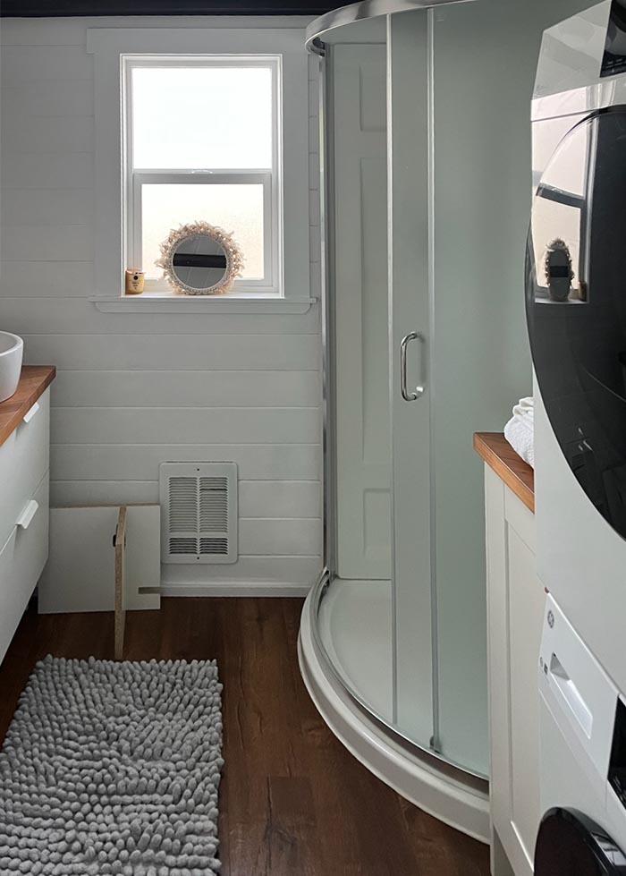 The Cabin at Beyond the Trail RV Park has a Bathroom with Washer/Dryer